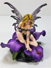 91653 Purple Winged Fairy Sitting on Flower Petals by Backwoods Lighting LLC picture