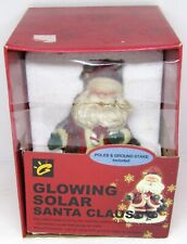 Glowing Solar Dancing Santa Claus w/Poles & Ground Stake picture