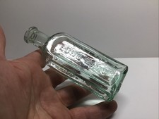 Antique Aqua Colored Lung Tonic Medicine Bottle. picture