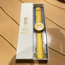 Mario Super Nintendo World Gold Power Up Band 1 YR Universal Studios  Hollywood picture