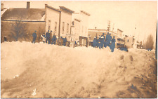 Snowy Main Street in Lake City Michigan Missaukee County 1908 RPPC Postcard #2 picture