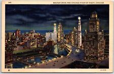VINTAGE POSTCARD BIRD'S EYE VIEW OF WACKER DRIVE & THE CHICAGO RIVER AT NIGHT picture