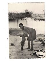 SB2531 AFRICAN WOMAN BREASTFEEDING HER CHILD RPPC picture