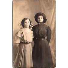 RPPC Two Women in Dresses and Bow in Hair Standing Vintage Real Photo Postcard picture