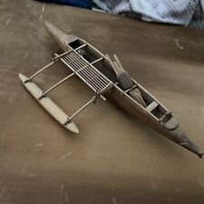 outrigger handmade canoe picture