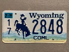 VINTAGE WYOMING LICENSE PLATE BUCKING BRONCO COMMERCIAL RANDOM LETTERS/NUMBERS picture
