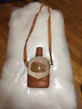 Fur and Leather Flask with Emblem picture