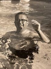 Vintage Photo Man in Pool Holding Cigarette Above Water Ball Floating Behind Him picture