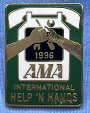 1996 AMA INTERNATIONAL HELP N HANDS PIN picture