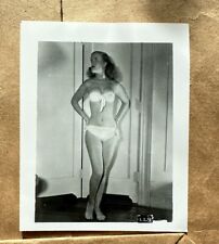 Vintage 1960s reprint bikini risqué lady woman black and white photography picture