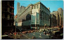 VINTAGE POSTCARD THE MACY'S PROCESSION AT HERALD SQUARE SHOWING MACY'S STORE '58 picture