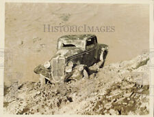 1938 Press Photo Mud covered car found after Santa Ana River waters subsided, CA picture